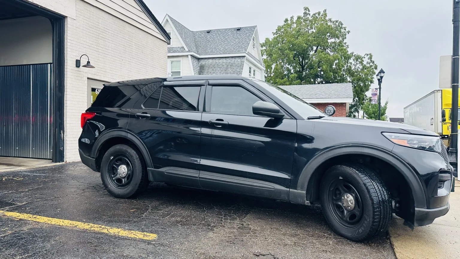 Dark tinted windows on a black SUV