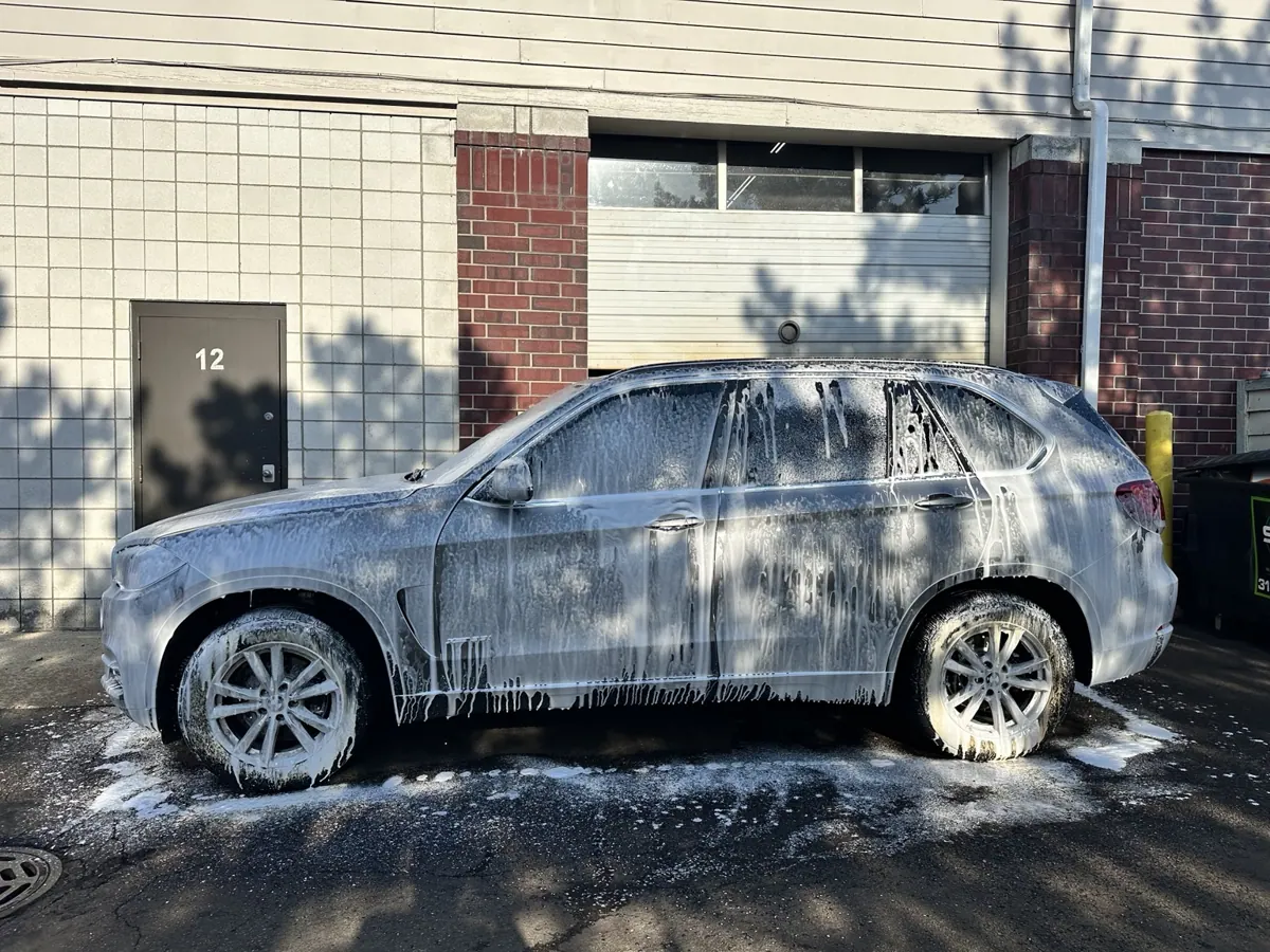 Exterior foam wash in progress.