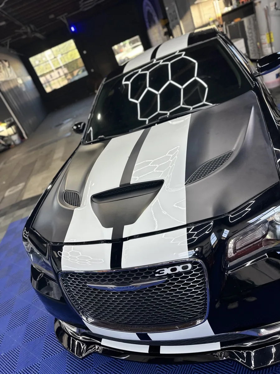 Custom vehicle hood wrap in progress